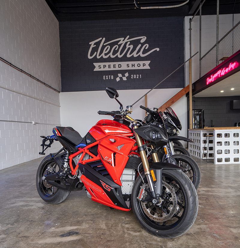 A red electric motor bike. 